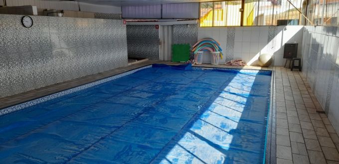 Academia com piscina aquecida